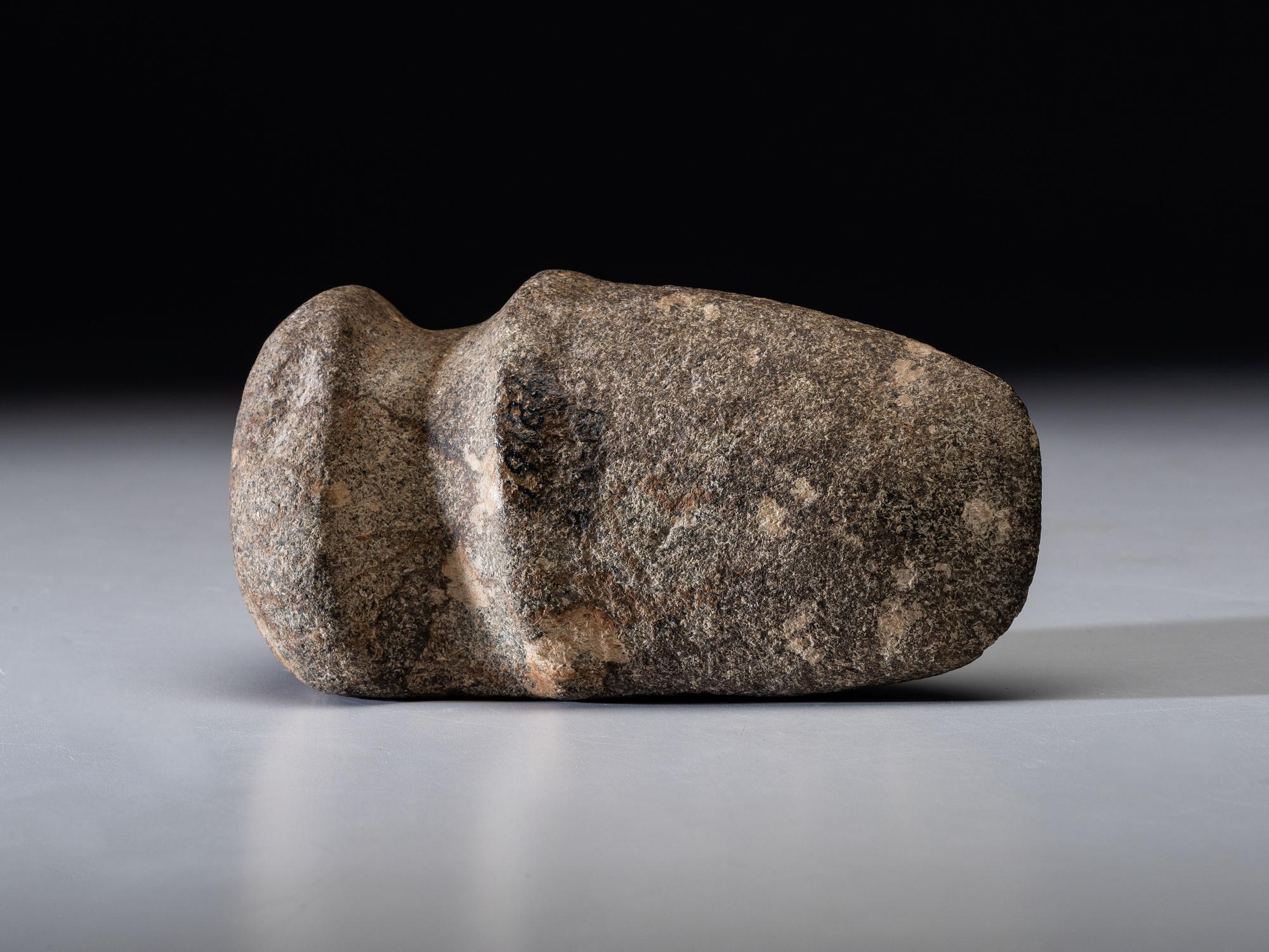 A Porphyry 3/4 Groove Axe