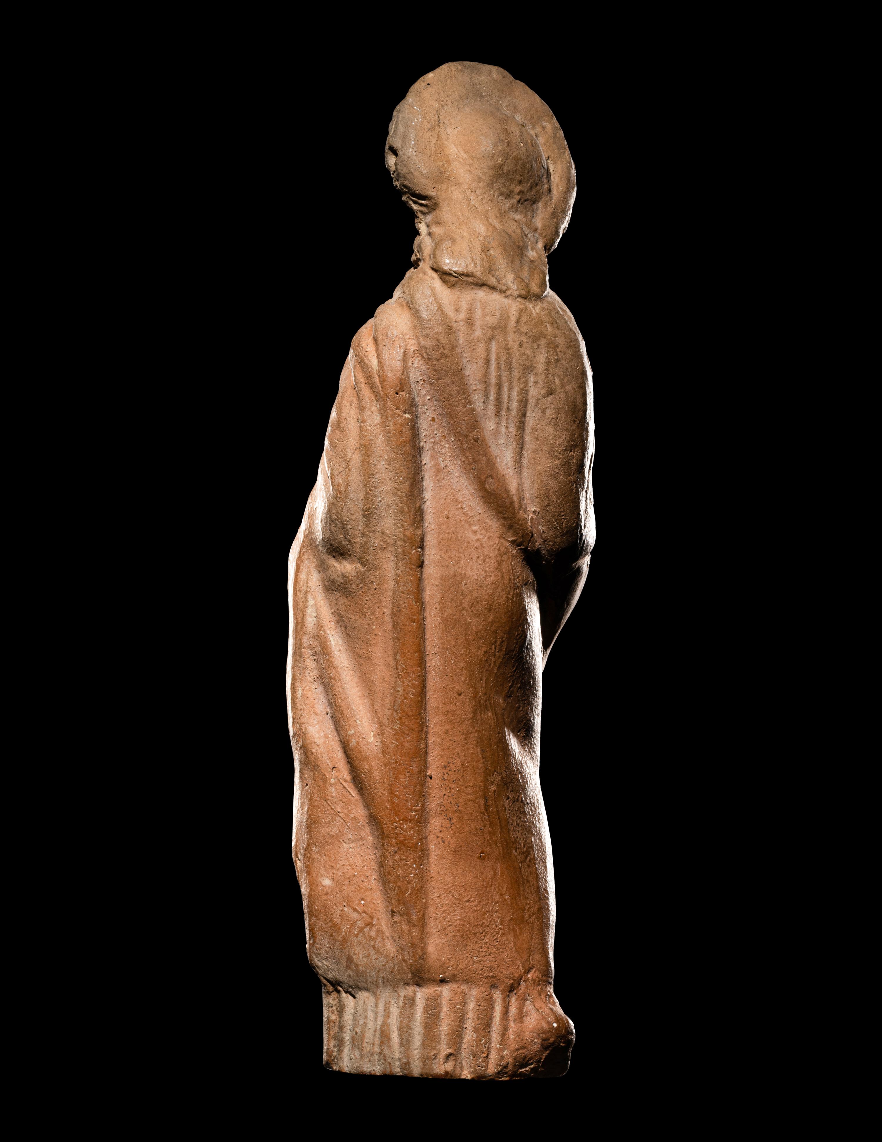 A Greek Terracotta Standing Draped Female