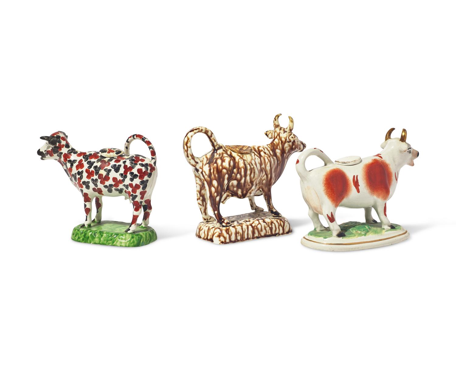A Group of Three Staffordshire Cow-Form Creamers