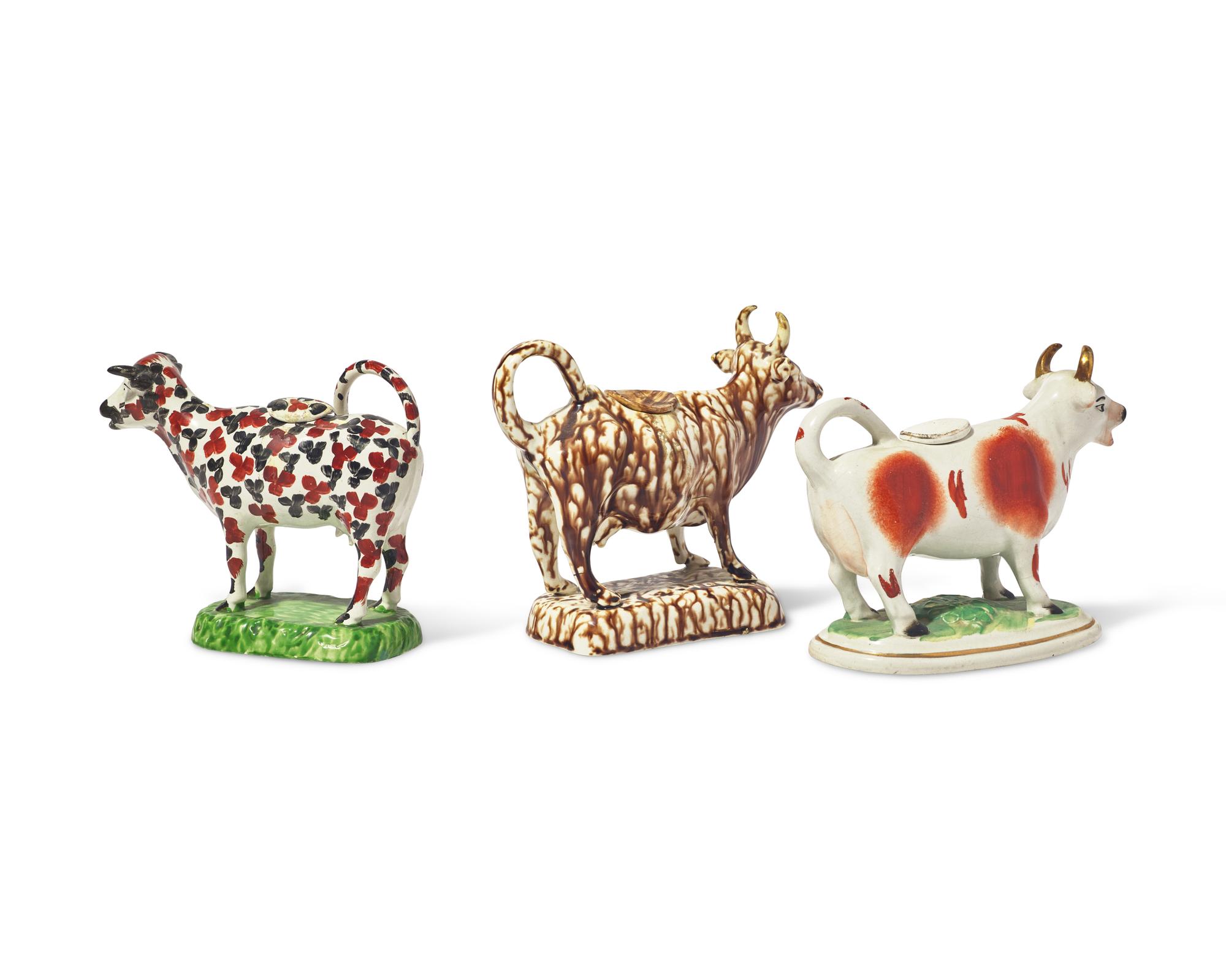 A Group of Three Staffordshire Cow-Form Creamers