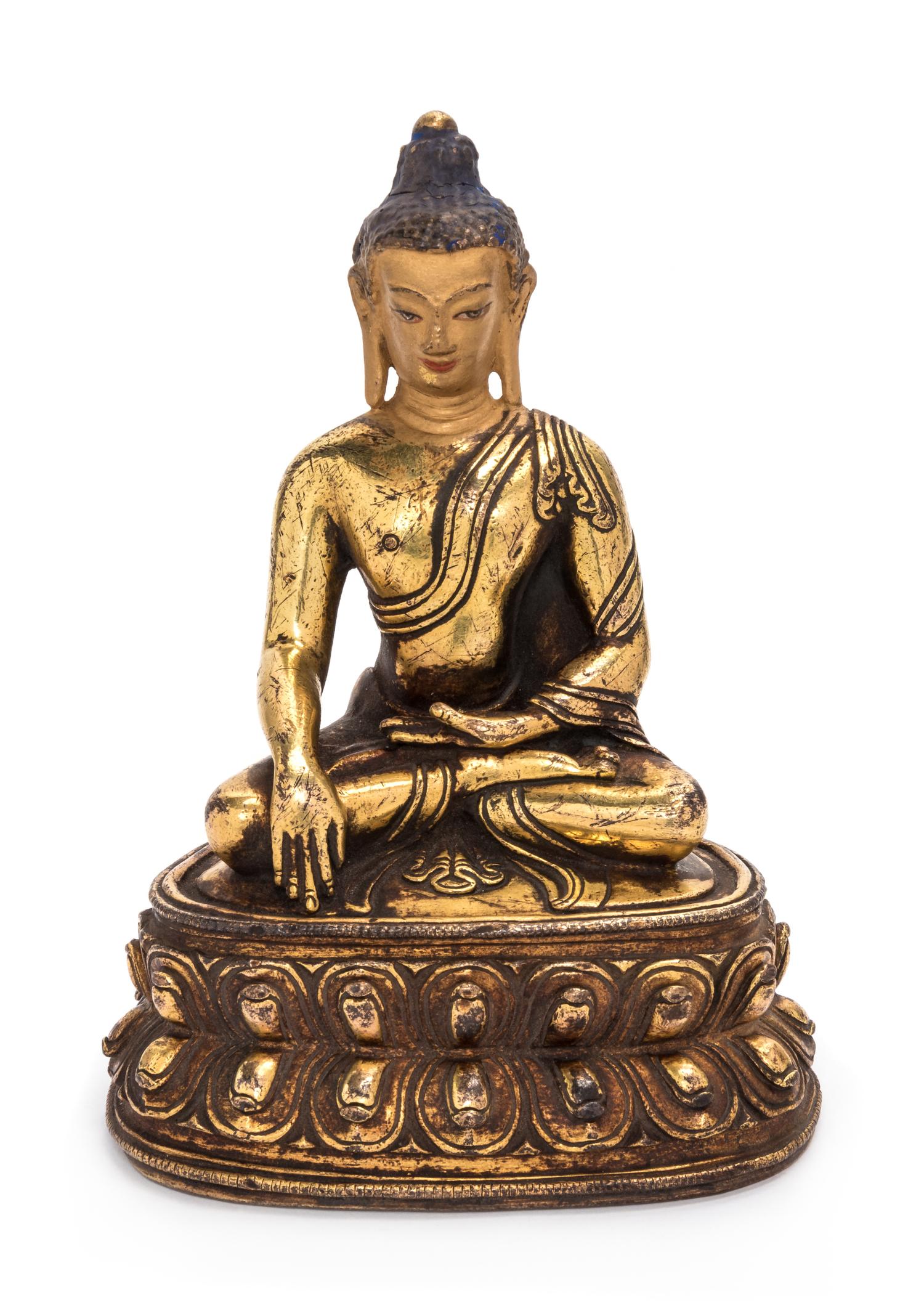A Sino-Tibetan Gilt Bronze Figure of Shakyamuni Buddha Height 6 inches. — 18TH/19TH CENTURY