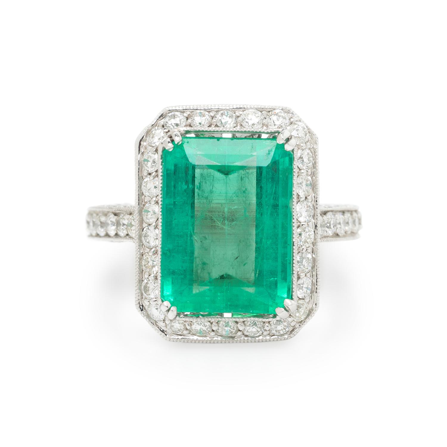 EMERALD, DIAMOND, AND WHITE GOLD RING