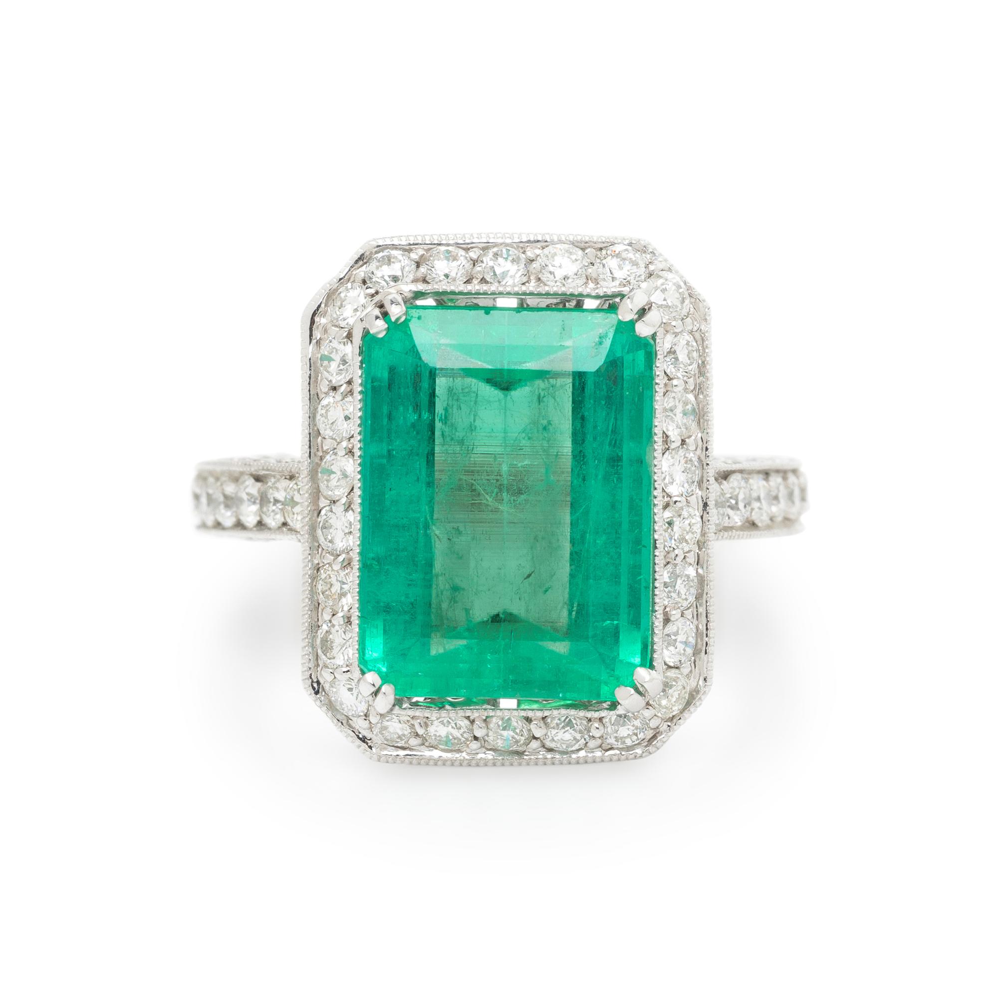 EMERALD, DIAMOND, AND WHITE GOLD RING