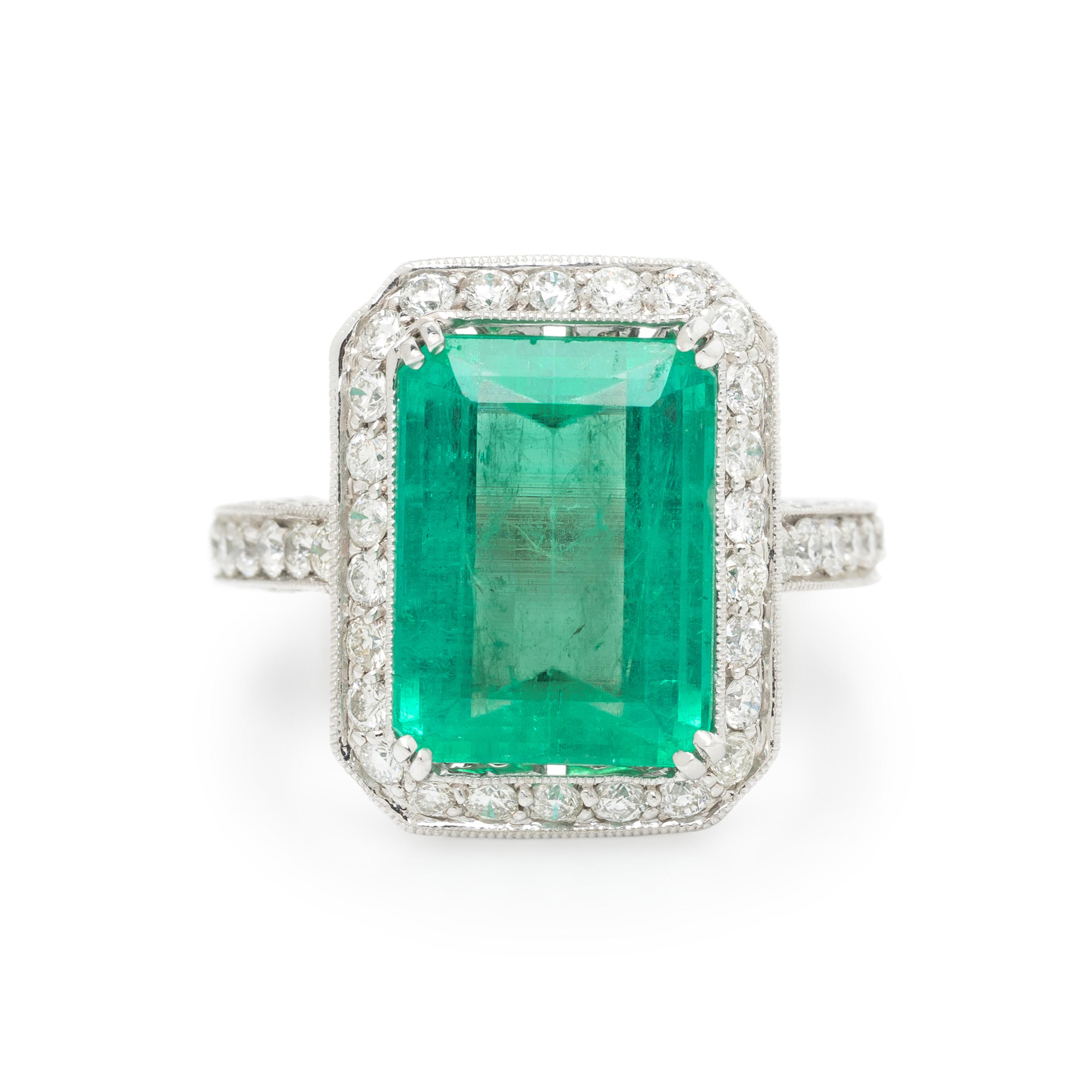EMERALD, DIAMOND, AND WHITE GOLD RING