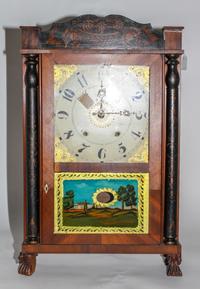 An Eli Terry American Mahogany Shelf Clock. Height overall 28 1/2 inches.