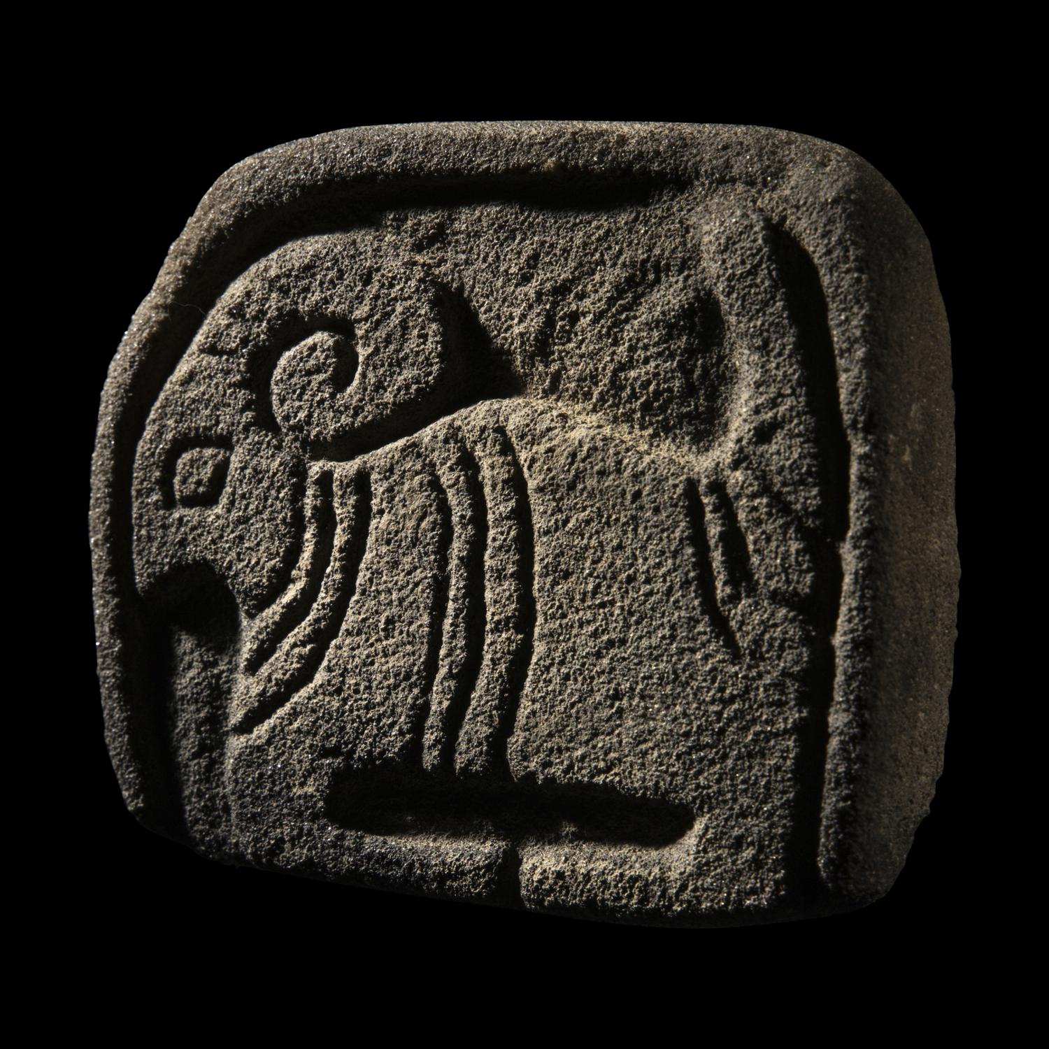 A South Arabian Stone Plaque of a Ram with Inscription