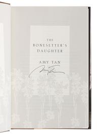 TAN, Amy (b. 1952). A group of 5 SIGNED OR INSCRIBED works by Tan, comprising: