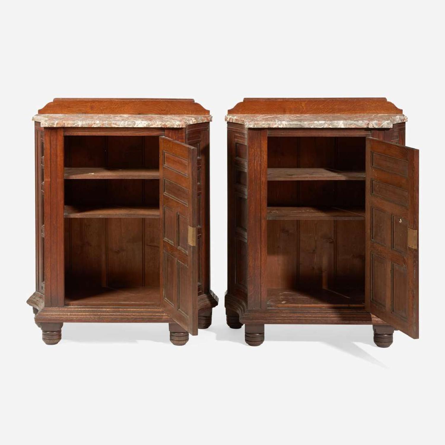 A pair of English Aesthetic Movement oak cabinets with Languedoc marble tops Attributed to Philip Webb (English, 1831-1915), England, circa 1870