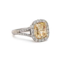 FANCY LIGHT YELLOW DIAMOND AND DIAMOND RING