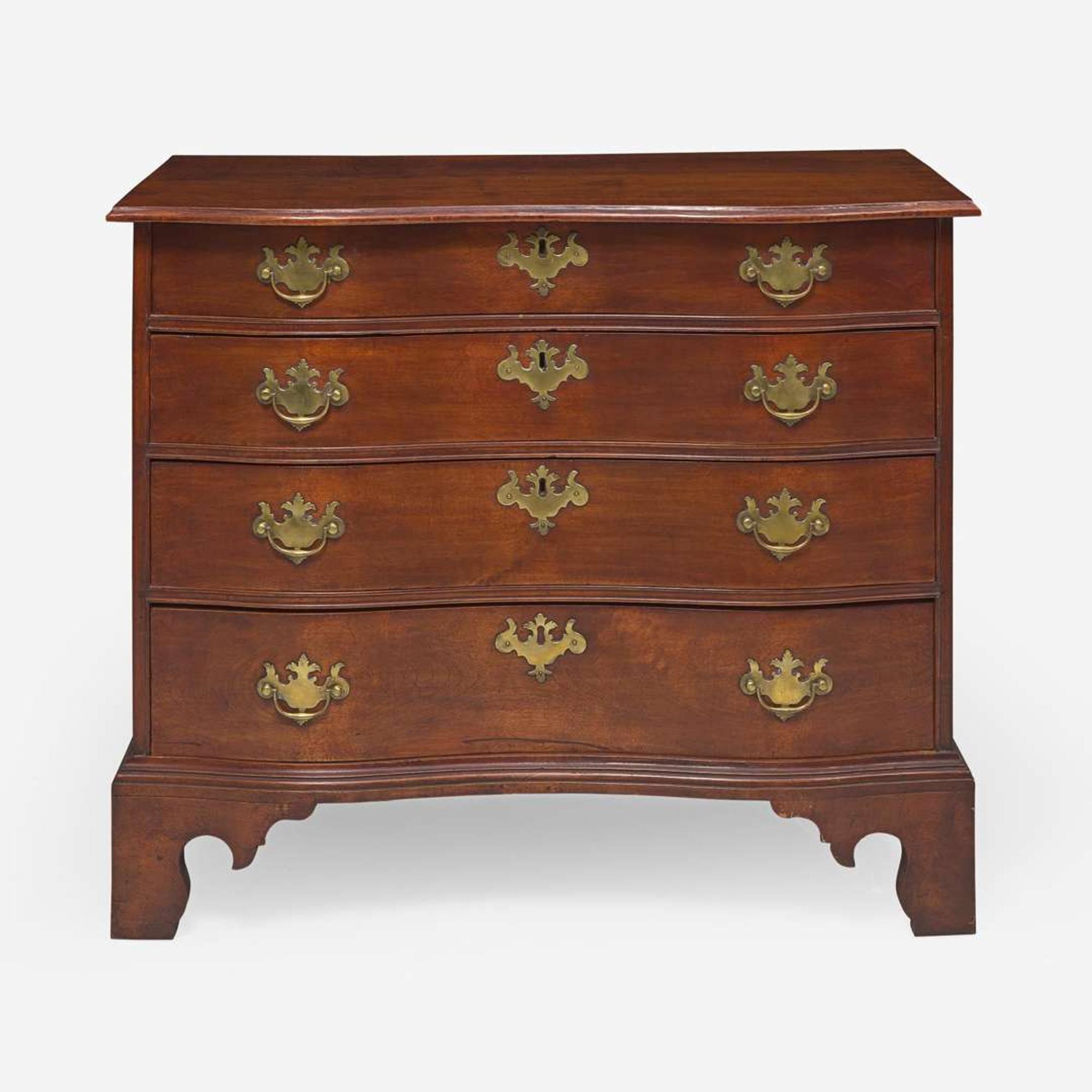 A Chippendale reverse serpentine carved maple and birch chest of drawers New England, circa 1785