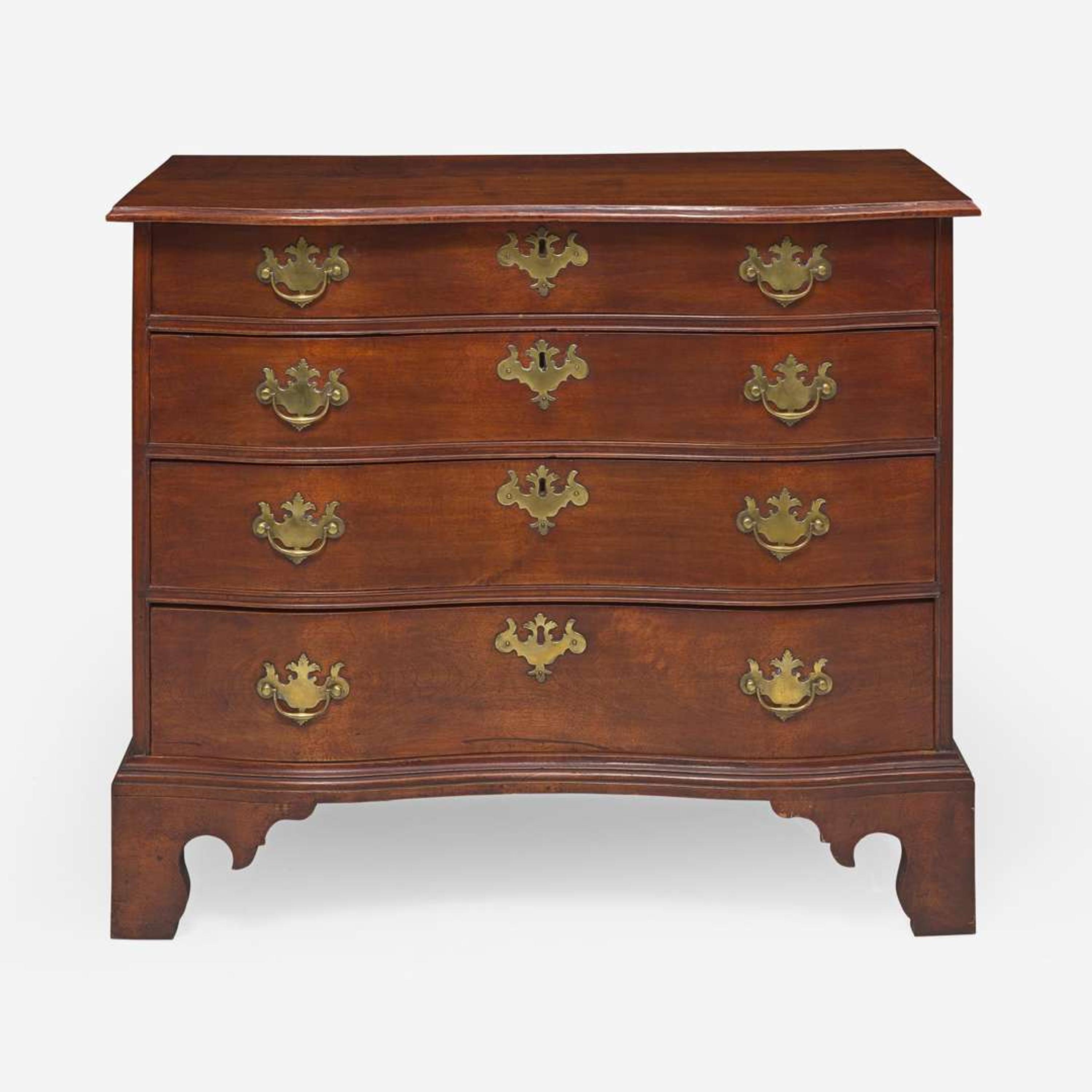 A Chippendale reverse serpentine carved maple and birch chest of drawers New England, circa 1785