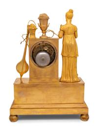An Empire Gilt Bronze Musical Clock