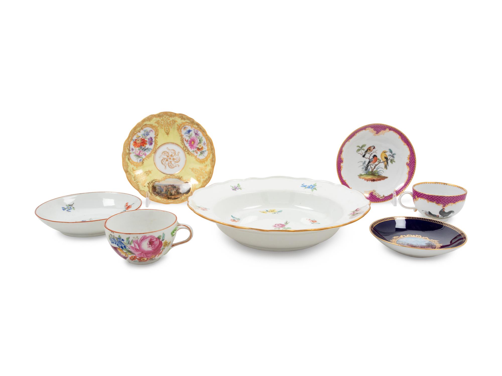Seven Meissen Painted and Parcel Gilt Porcelain Table Articles