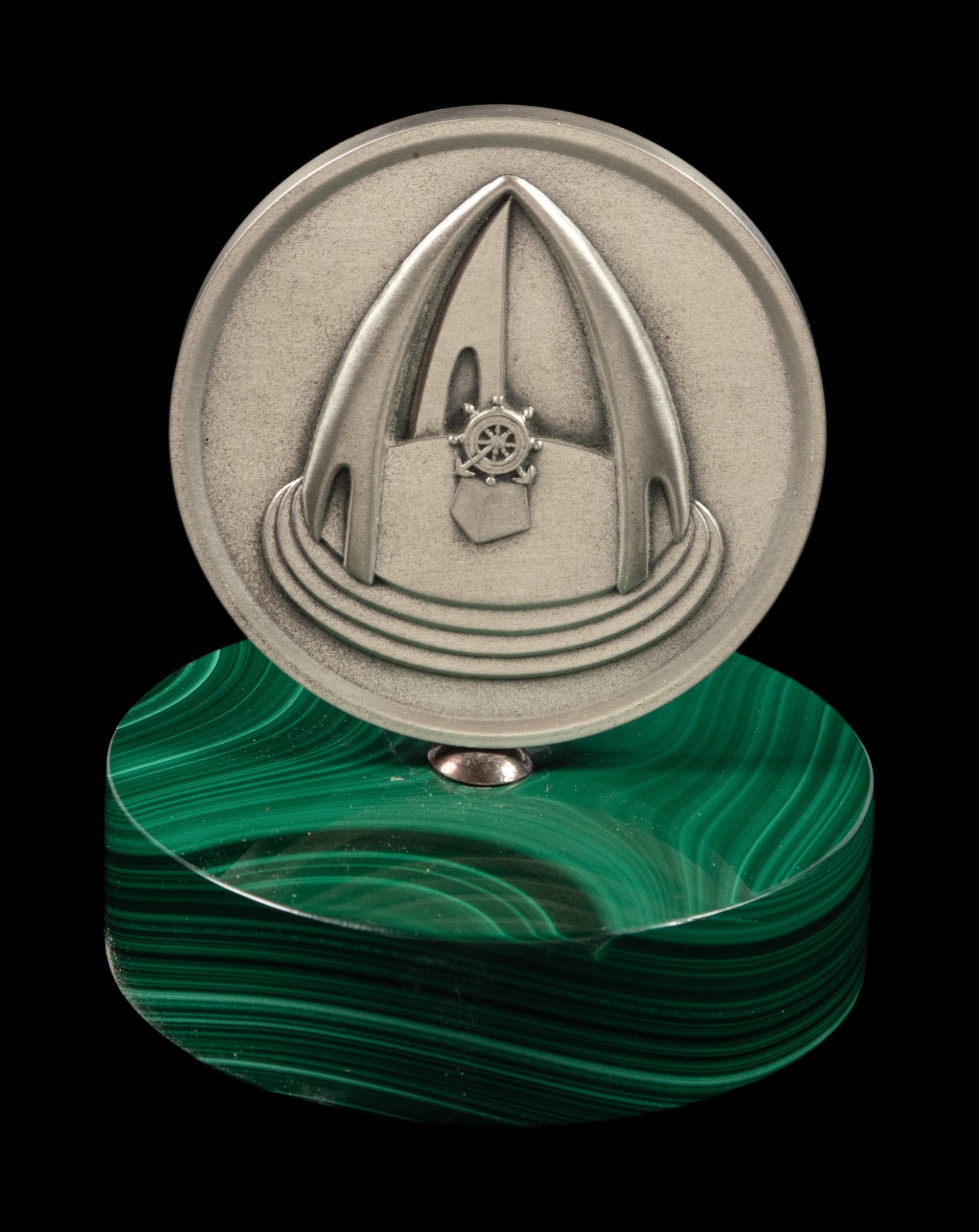 A Cartier Silver Saudi Arabian Commemorative Medal with a Malachite Base