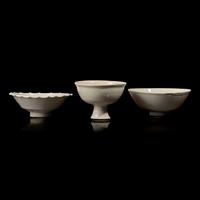 Two Chinese Huozhou White Glazed Bowls and a Stem Cup, Song Dynasty 宋 霍州窯白釉瓷碗二及高足杯一