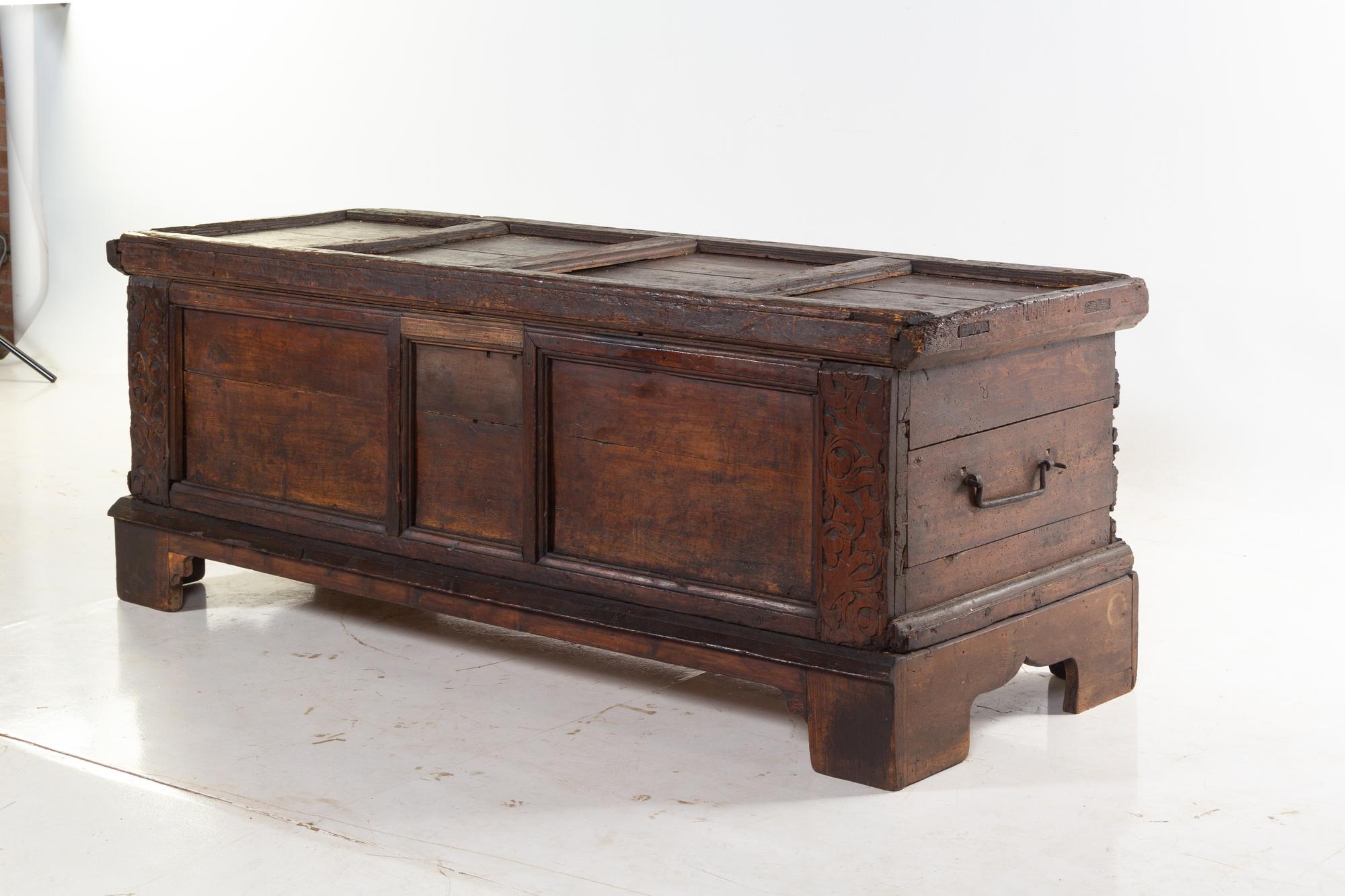 A German Carved and Paneled Walnut Kast