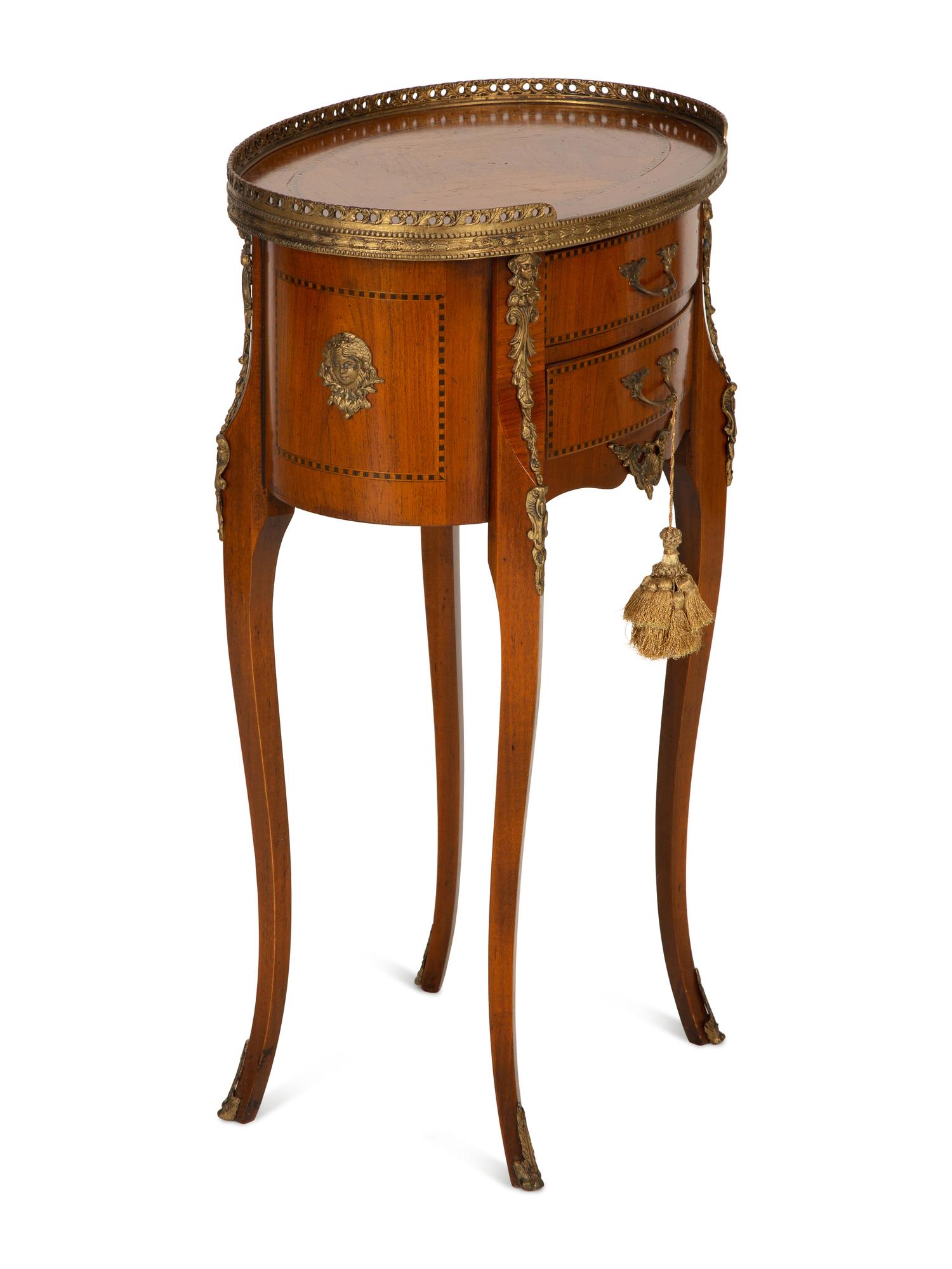 A Louis XV/XVI Transitional Style Gilt Metal Mounted Fruitwood Side Table