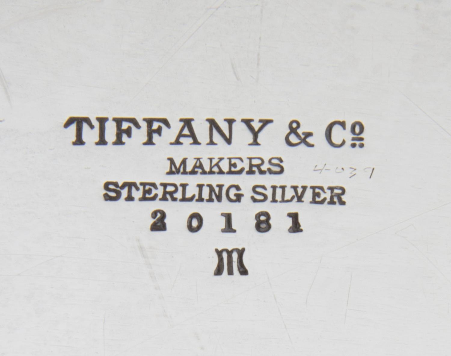 An American Silver Tray, Tiffany & Co., New York, NY, of oval form, the border with the engraved monogram EWE.
