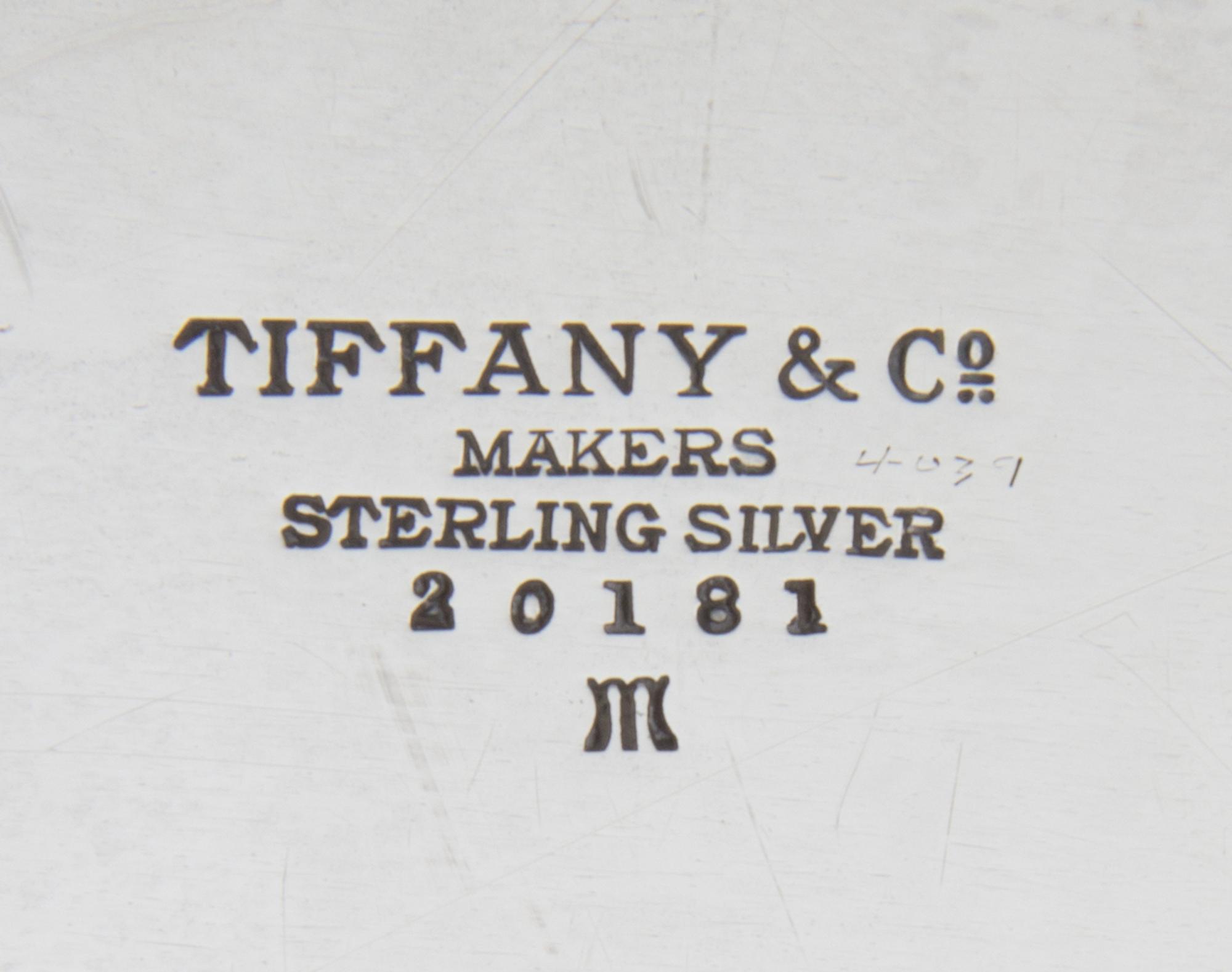 An American Silver Tray, Tiffany & Co., New York, NY, of oval form, the border with the engraved monogram EWE.