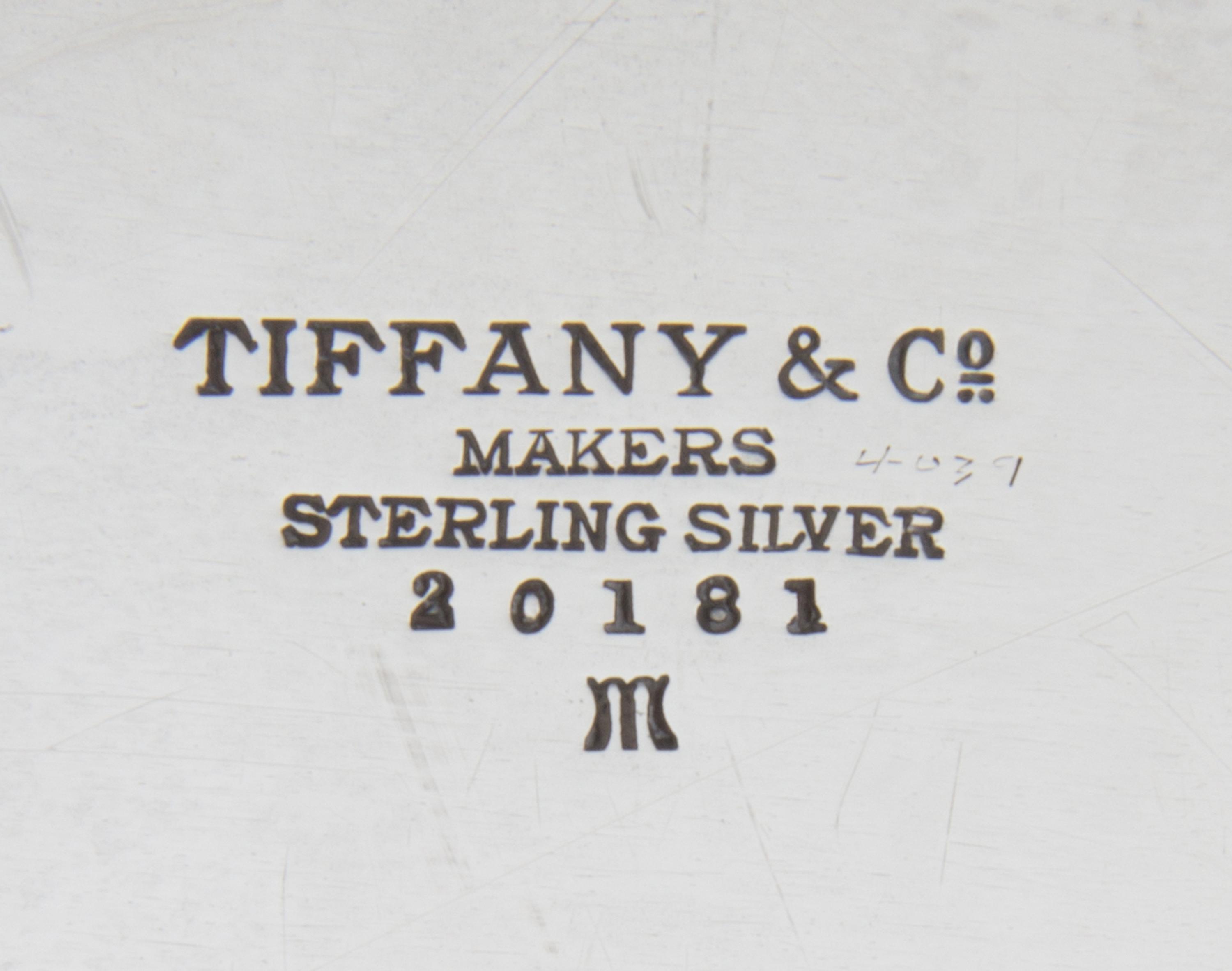 An American Silver Tray, Tiffany & Co., New York, NY, of oval form, the border with the engraved monogram EWE.
