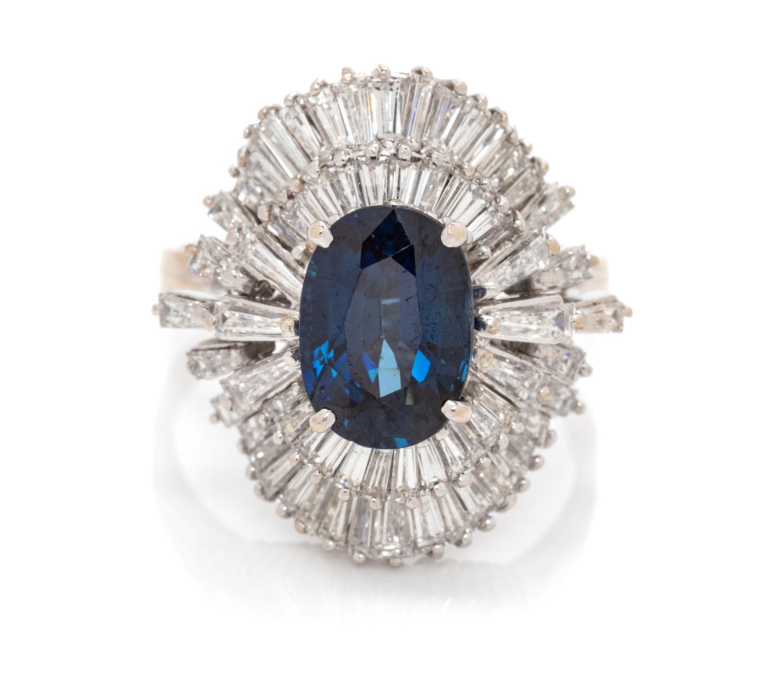 An 18 Karat White Gold, Sapphire and Diamond Ring, 6.00 dwts.
