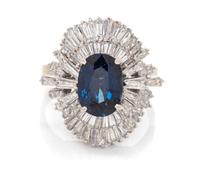 An 18 Karat White Gold, Sapphire and Diamond Ring, 6.00 dwts.