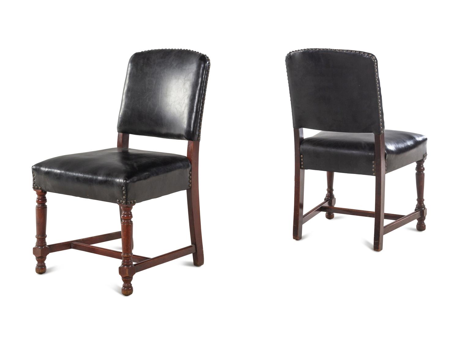 A Pair of Leather-Upholstered Side Chairs