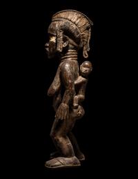 A Dan Wood Standing Female Figure
