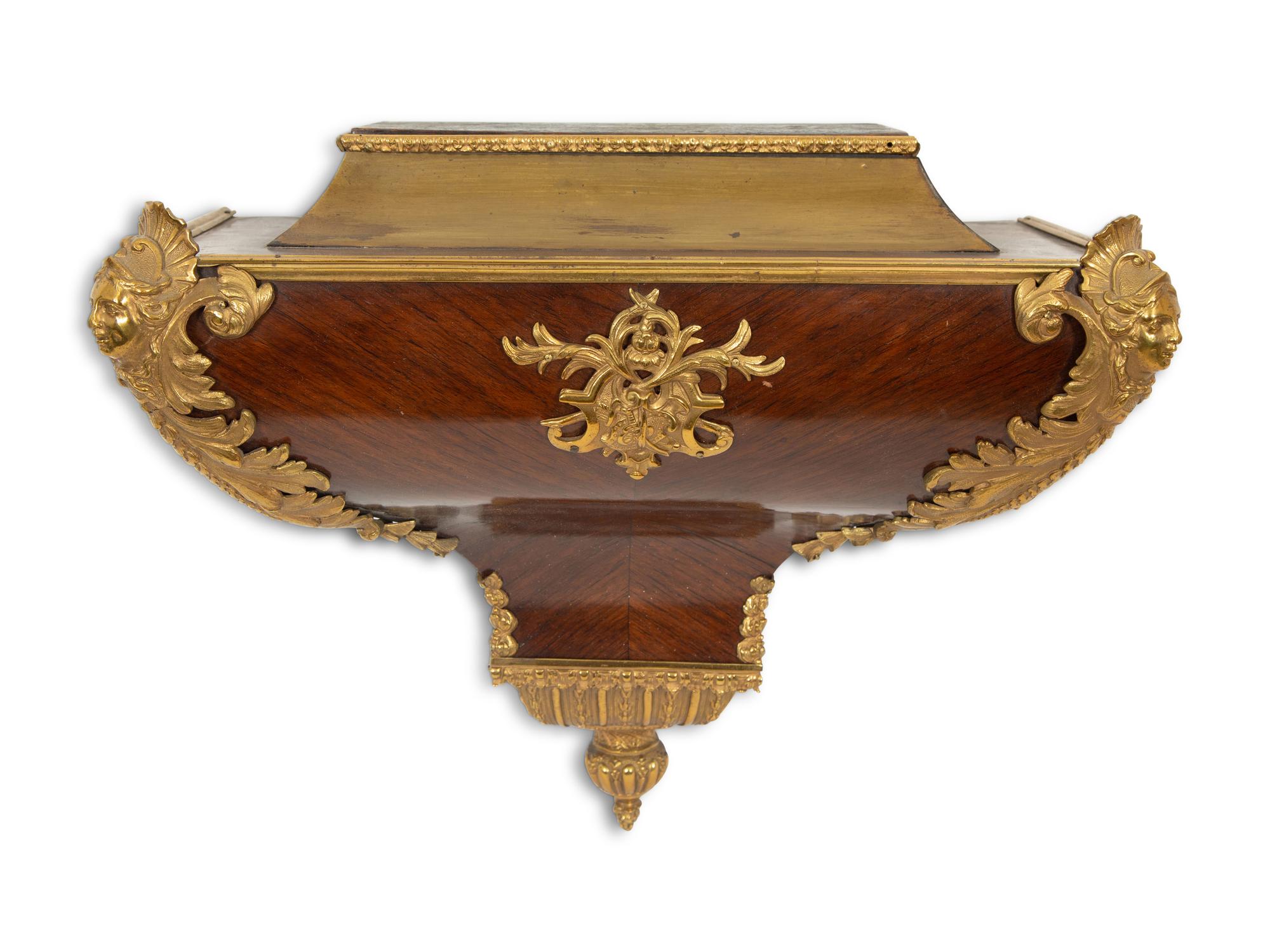 A Louis XV Gilt Bronze Mounted Kingwood Bracket Clock with Matching Wall Bracket
