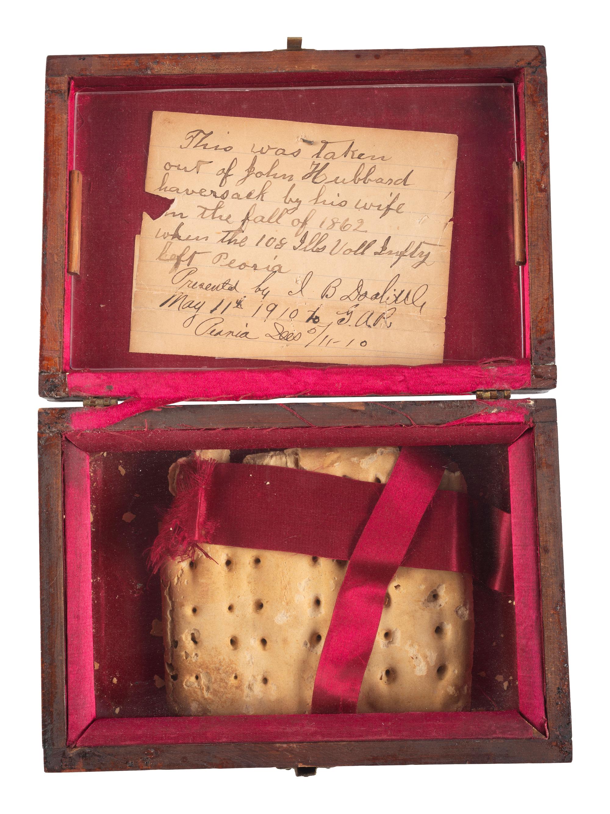 [CIVIL WAR]. Hardtack taken from haversack of Private John Hubbard, Co. B, 108th Illinois Volunteer Infantry, and kept by his wife as a memento.