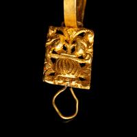 A Pair of Chinese Gold 'Figural and Fruits' Plaque Earrings, Paihuan, Qing Dynasty 清 童子瓜果紋 金 牌環一對