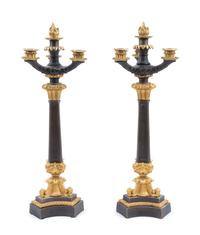 A Pair of Charles X Style Gilt and Patinated Bronze Four-Light Candelabra