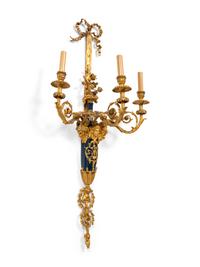 A Pair of Louis XVI Style Part Ebonized and Gilt-Bronze Three-Light Sconces