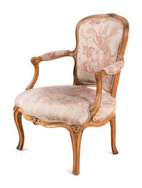 A Louis XV Carved Fruitwood Fauteuil