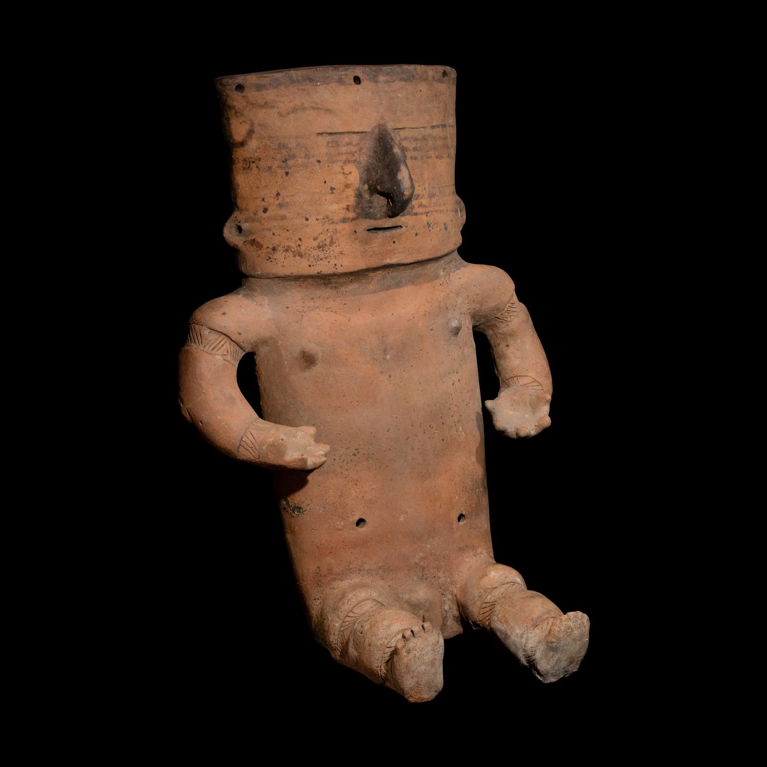 A Quimbaya Terracotta Seated Figure