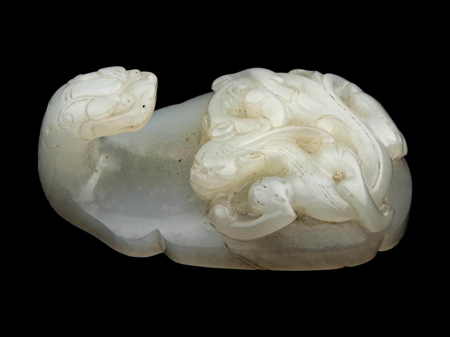 A Chinese White Jade 'Chilong' Belt Hook