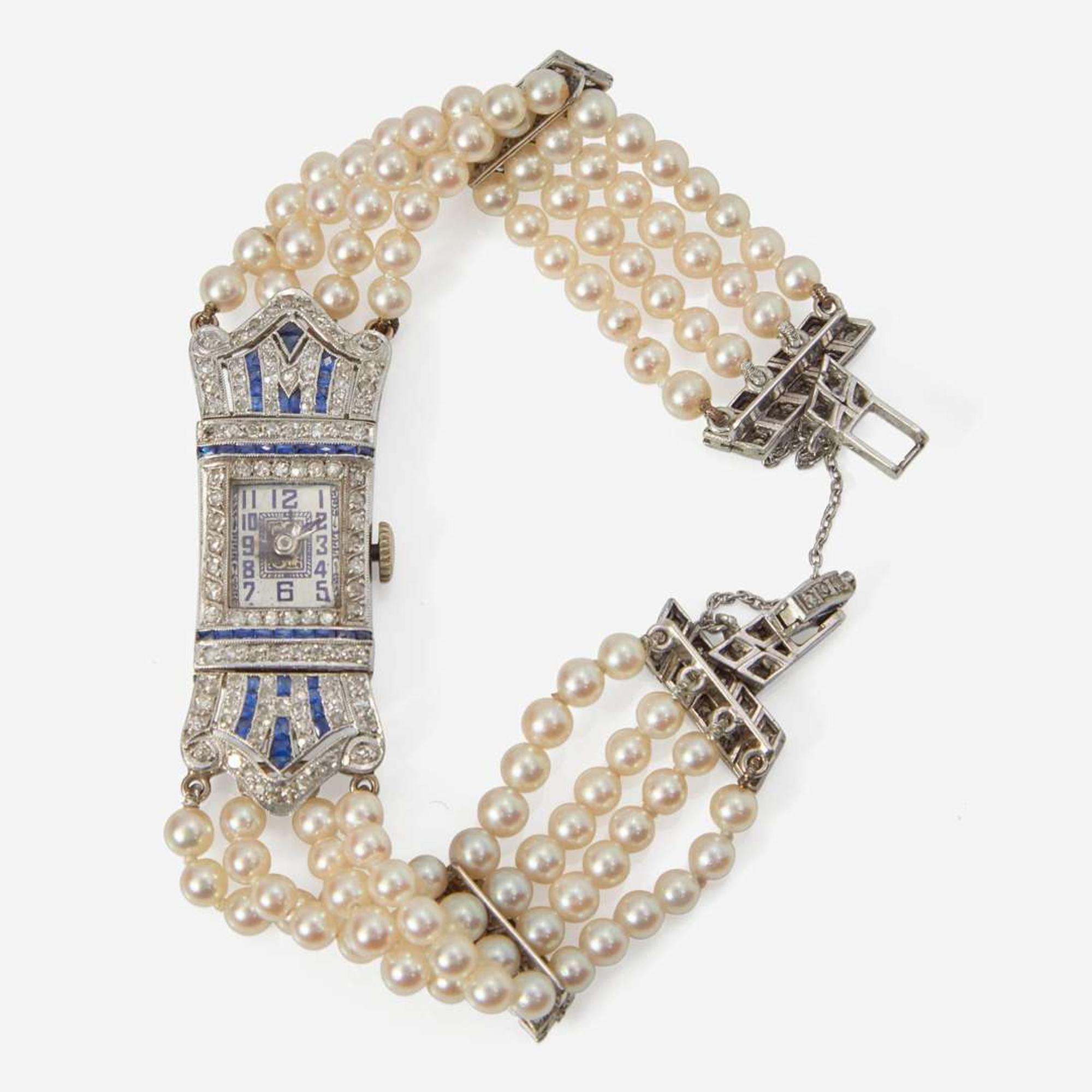 An Art Deco Pearl, Diamond, and Sapphire Watch
