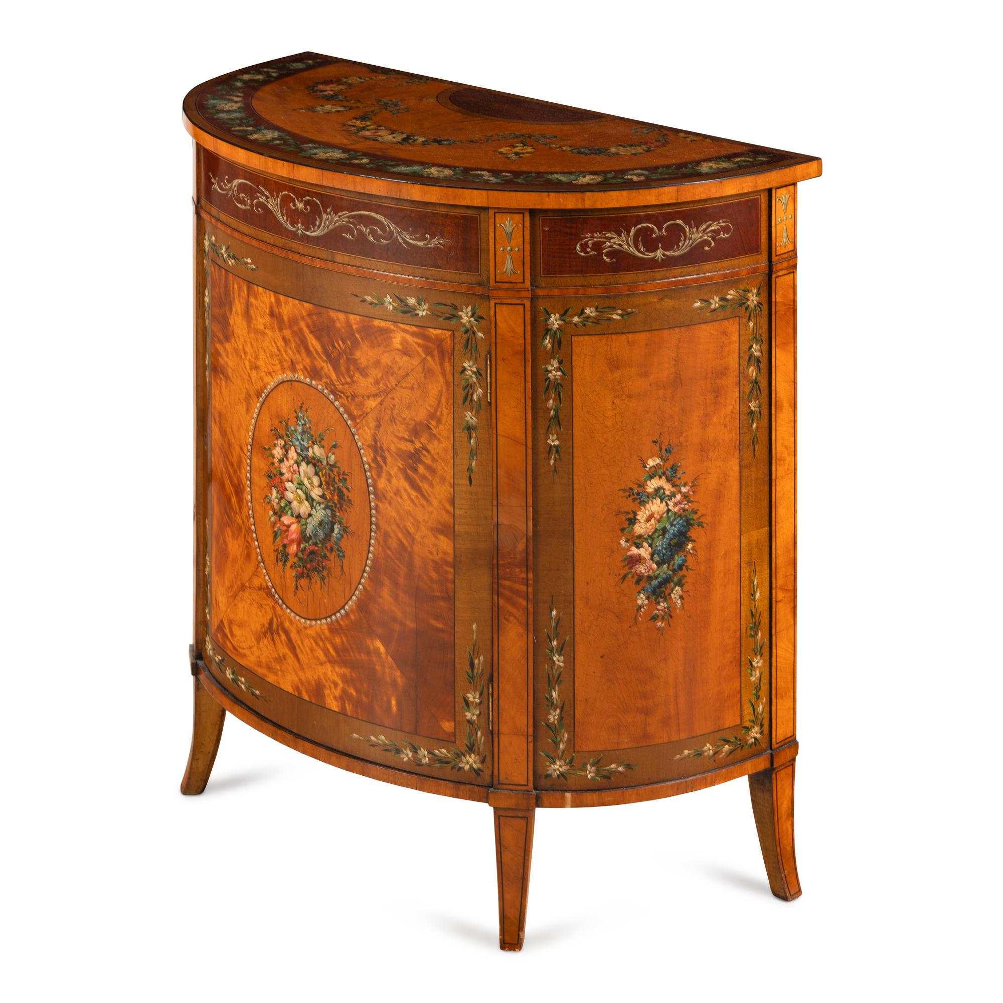 An Edwardian Mahogany, Satinwood and Polychrome Painted Demilune Cabinet
