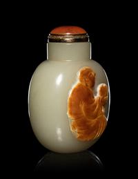 A Carved Russet and Celadon Jade Snuff Bottle