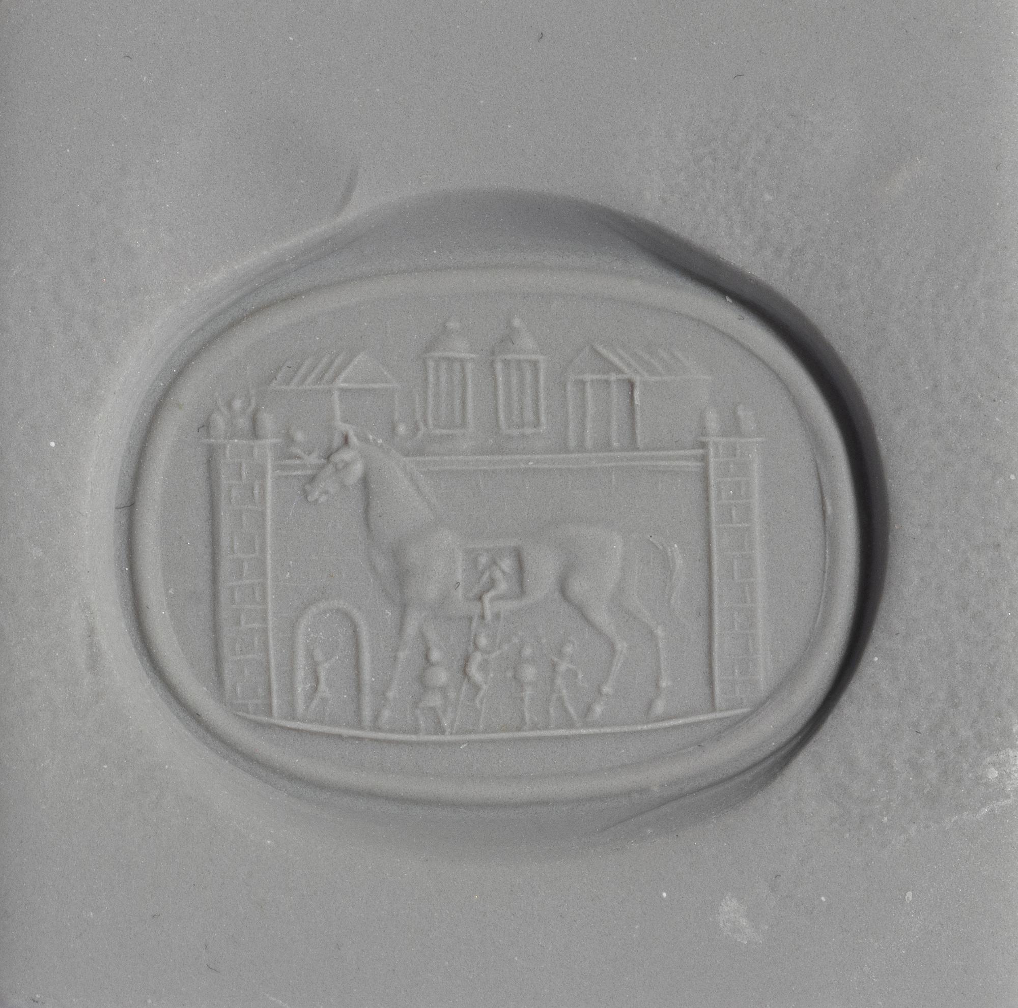 A Neoclassical Gold and Glass Finger Ring with a Homeric Scene of the Trojan Horse