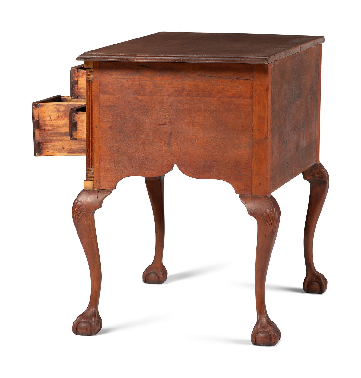 A Chippendale Shell and Fan Carved Cherrywood Ball and Claw Foot Dressing Table