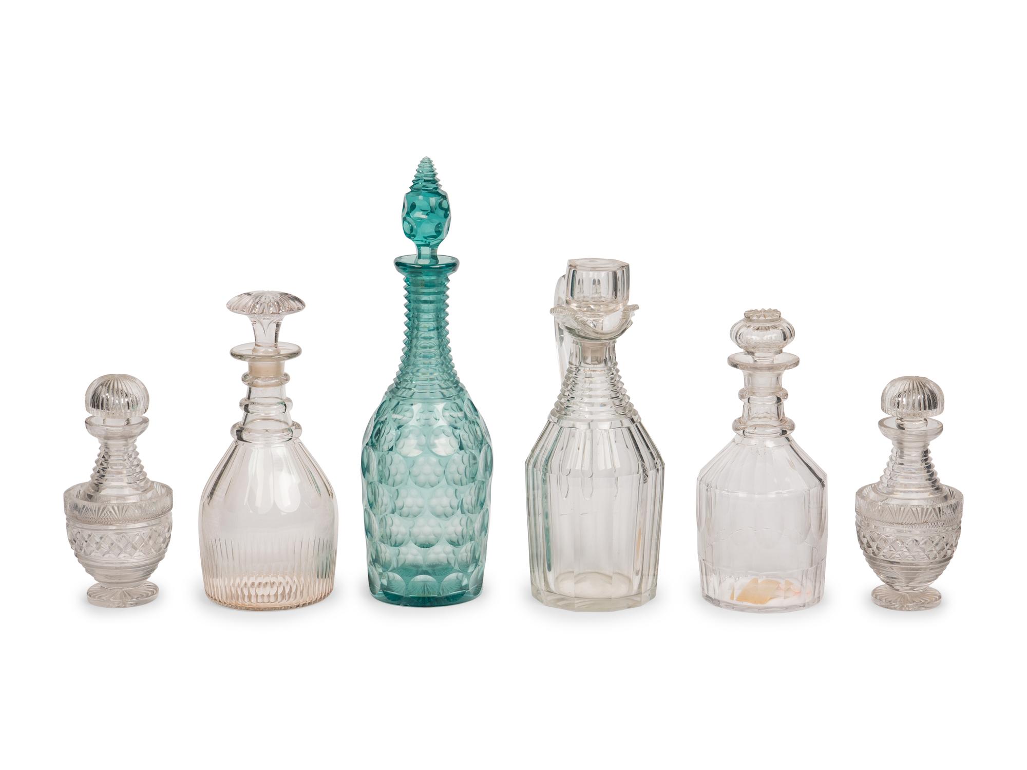 A Collection of Glass Decanters