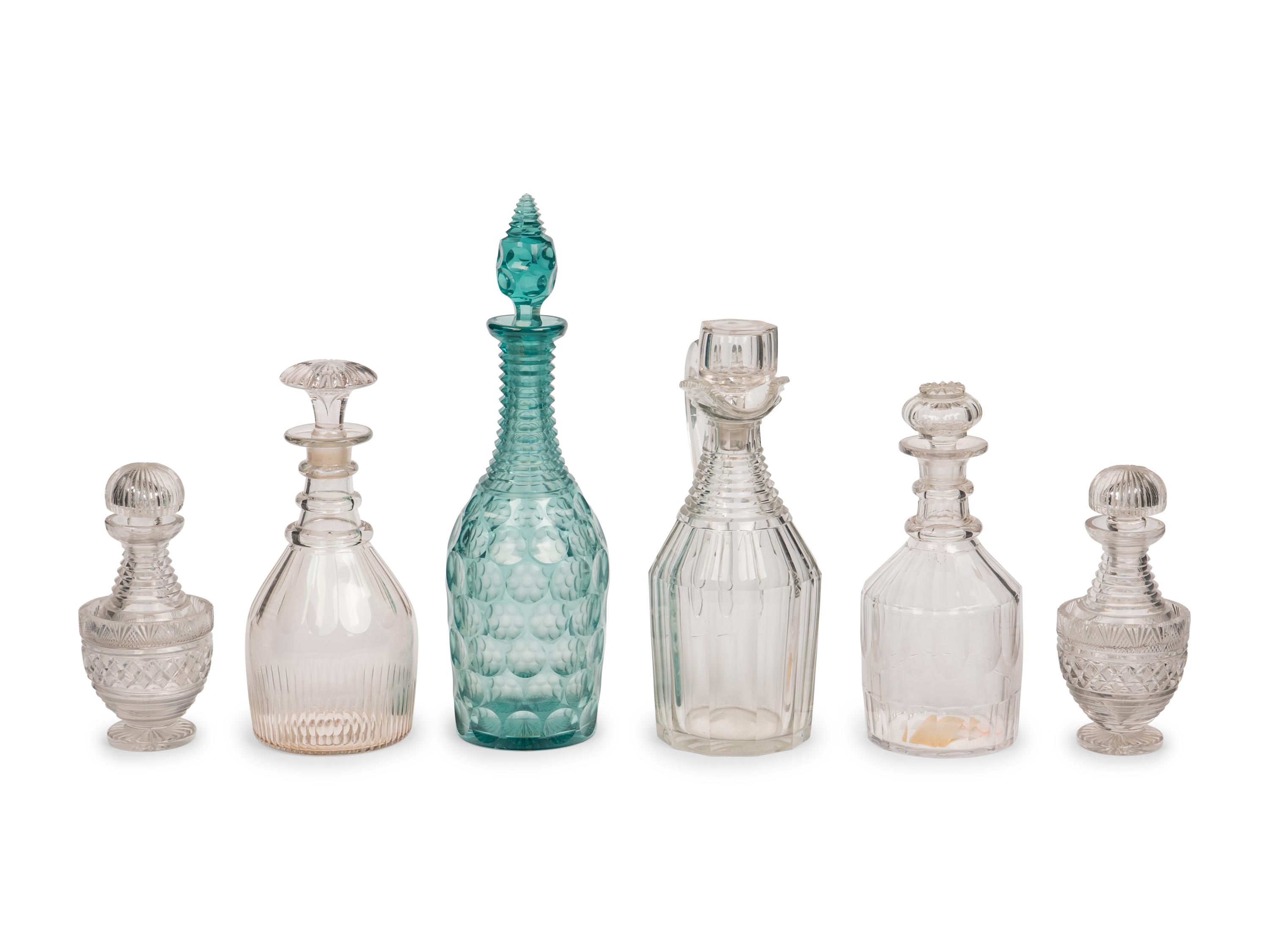 A Collection of Glass Decanters