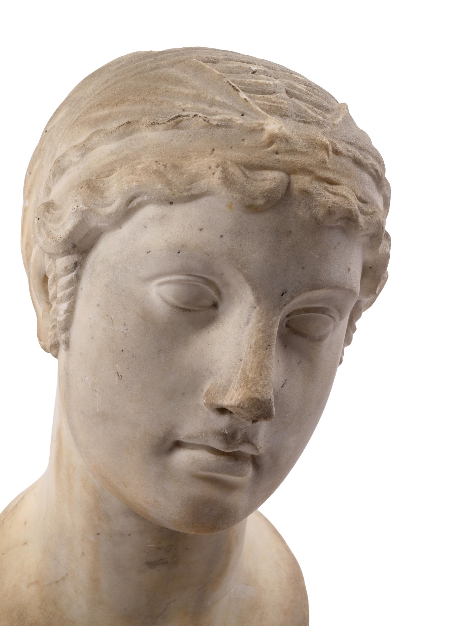 Two Continental Marble Female Heads