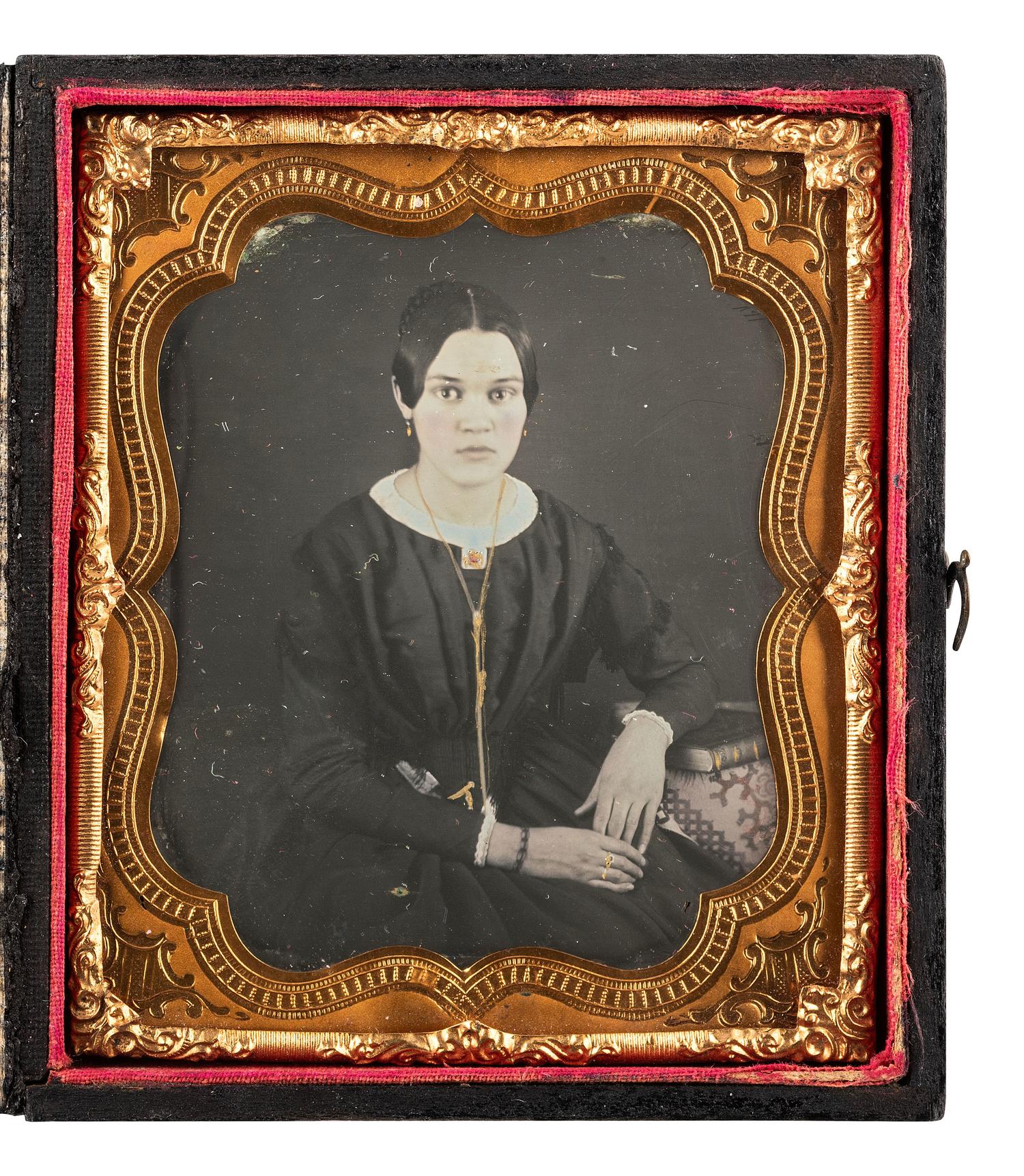 [EARLY PHOTOGRAPHY]. A group of 3 sixth plate daguerreotypes of lovely young women.