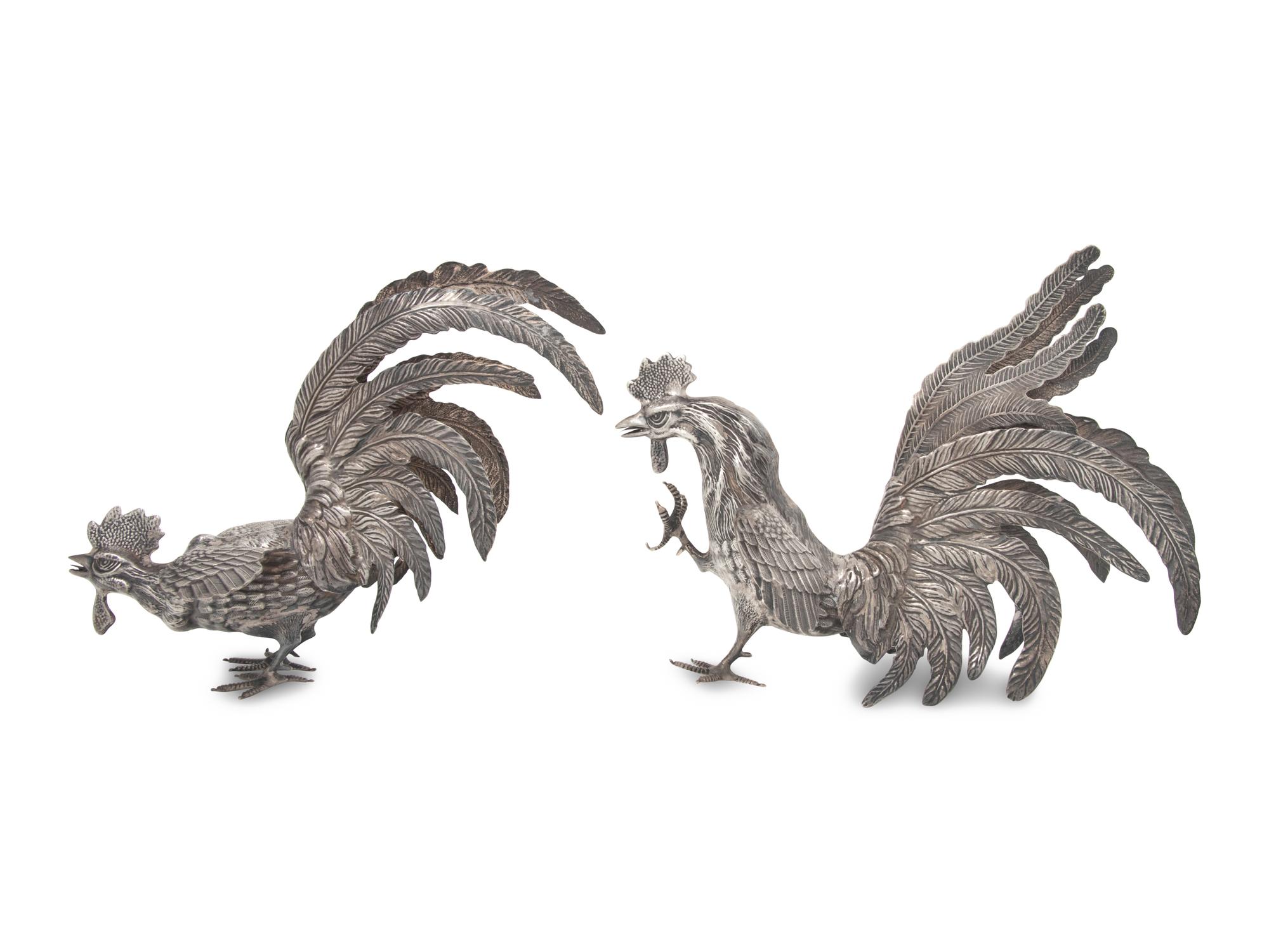 A Pair of German Silver Figures of Fighting Cockerels