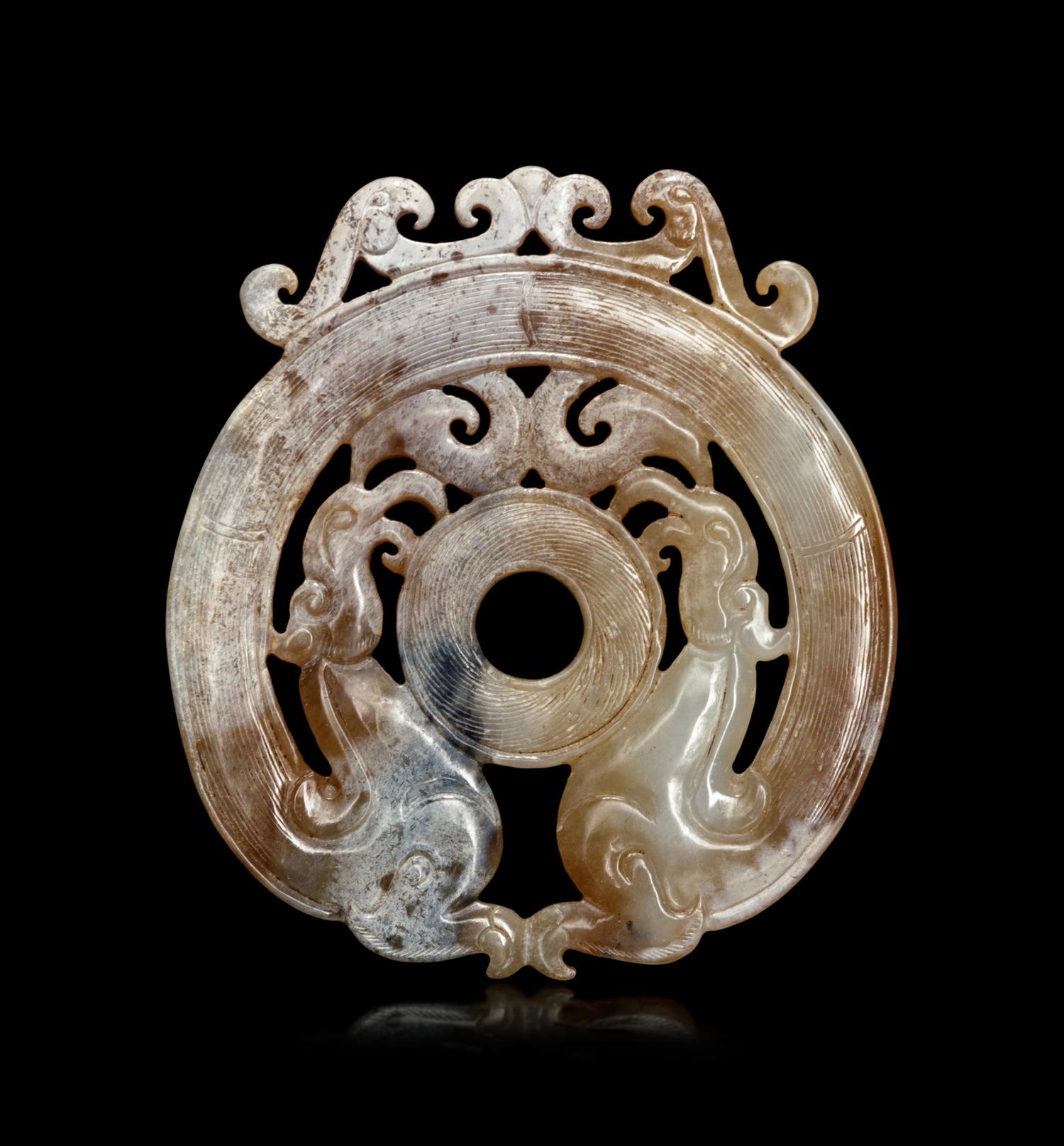 A Mottled Yellow Jade 'Phoenix' Plaque