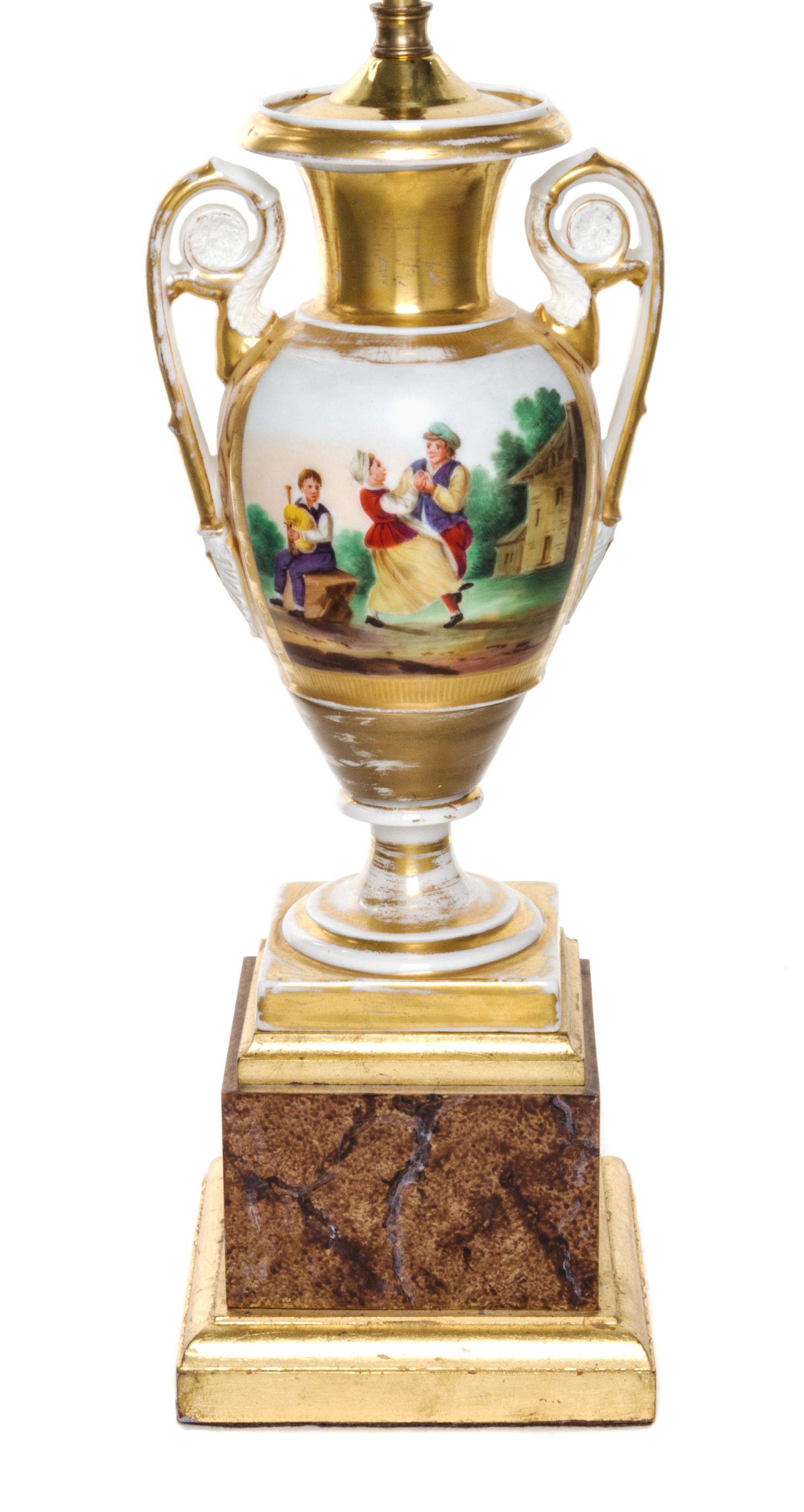 A Paris Porcelain Urn Height overall 28 inches.