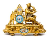 A Napoleon III Style Gilt Metal and Porcelain Mantel Clock Height 15 3/4 x width 21 1/2 inches. — LATE 19TH/EARLY 20TH CENTURY