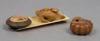 A Group of Three Wood Netsuke, Length of longest 4 1/8 inches.